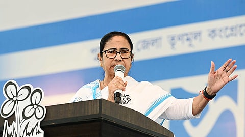 West Bengal Chief Minister Mamata Banerjee addresses the rally in support of Trinamool Congress (TMC) candidate from Purulia constituency, Santiram Mahato for the LS elections, in Purulia. 