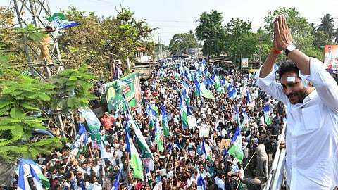CM YS Jagan Mohan Reddy during bus yatra at Undi on Tuesday. 