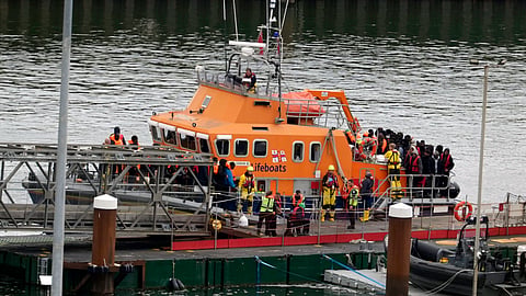 A group of people thought to be migrants are brought into Dover, Kent, by the Border Force, on Tuesday, April 23, 2024. 
