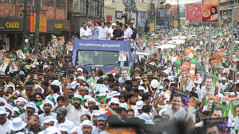 Rahul Gandhi waving at the public during his roadshow in Kalpetta, Wayanad.