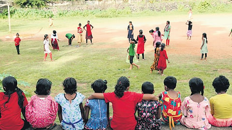 School children playing the school