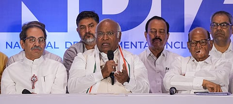 Congress President Mallikarjun Kharge with NCP (Sharad) Chief Sharad Pawar and Shiv Sena (UBT) Chief Uddhav Thackeray during an INDIA alliance press conference, in Mumbai, Saturday, May 18, 2024. 
