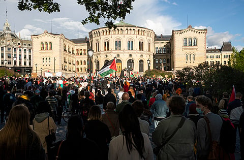 People gather in support of the Palestinain people, amid the conflict with Israel, in front of the parliament building in Oslo, Norway, on May 19, 2021.