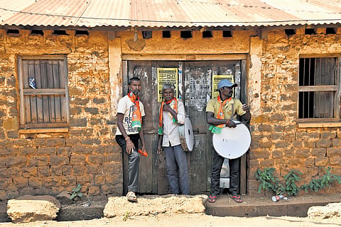 BJP activists campaign in Pudur village of Chevella constituency
