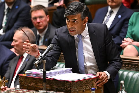 A handout photo released by the UK Parliament shows Britain's PM Rishi Sunak speaking during the weekly session of Prime Minister's Questions (PMQs), in the House of Commons in central London, on May 15, 2024. 