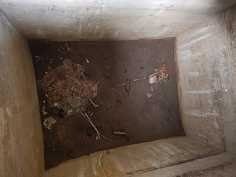 The human skeleton found inside an empty septic tank pit of a house under construction near Sirkazhi on Monday.