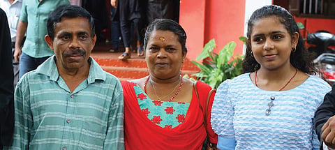 Subrahmanian and Krishnakumari along with their daughter Ahalya in front of the Alappuzha Family Court 