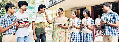 Teacher offers sweet to students after class 12 results in Chennai 
