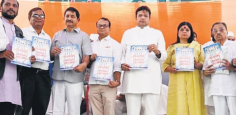 AICC Telangana in-charge Deepa Dasmunshi,  State Manifesto Committee chairman D Sridhar Babu and other Congress leaders release the state-specific manifesto 
on Friday