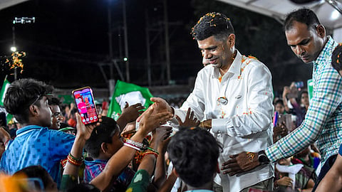 BJD's star campaigner and 5T Chairman  VK Pandian greets people during a public meeting.