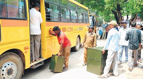 Polling officials leave a Distribution, 
Reception and Collection 
Centre after collecting ballot boxes on the eve of the Warangal- Khammam-Nalgonda graduates MLC byelection in Mulugu district on Sunday