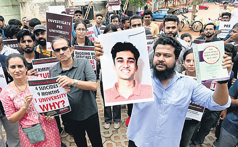 Parents of the deceased, volunteers and students protest against the university’s ‘harrassment’ of students, at Freedom Park on Saturday 