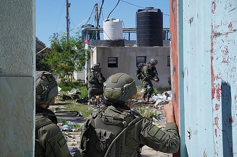 This handout picture released by the Israeli army on May 8, 2024 shows Israeli forces operating in Rafah in the southern Gaza Strip. 