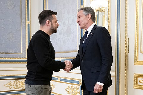 Ukraine's President Volodymyr Zelensky (L) greets US Secretary of State Antony Blinken (R) prior to their meeting in Kyiv on May 14, 2024.