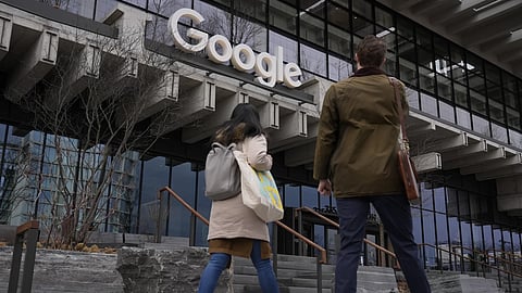 People arrive at the recently opened Google building in New York, Feb 26, 2024.