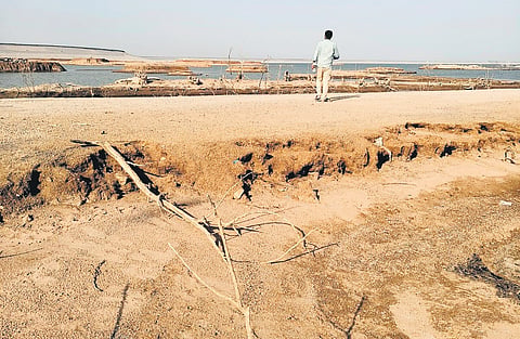 The remnants of villages that were submerged for the Kondapochamma project are now visible again due to the depleting water levels in the reservoir