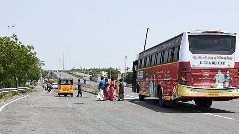 A TNSTC bus skipping the service road to Palpannai and dropping off passengers on the Tiruchy national highway instead, on Thursday