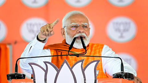 Prime Minister Narendra Modi addresses a public meeting for Lok Sabha polls in Khargone, Tuesday, May 7, 2024.