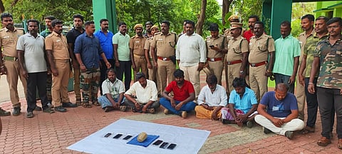 The persons who were arrested by KMTR forest personnel for possessing an elephant ivory.  