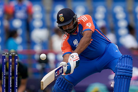 India's captain Rohit Sharma plays a shot against Australia during an ICC Men's T20 World Cup cricket match on June 24, 2024. 
