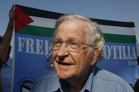 In this Oct. 20, 2012, file photo activist Noam Chomsky stands during a press conference to support the Gaza-bound flotilla in the port of Gaza City. 