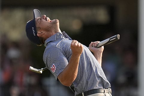 Bryson DeChambeau celebrates after winning the US Open golf tournament, Sunday, June 16, 2024, in Pinehurst, N.C. 