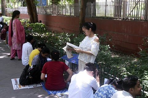 Aspirants outside an examination centre before the Union Public Service Commission  Civil Services Preliminary Examination, in New Delhi.