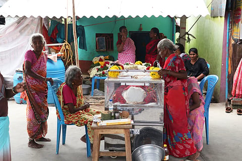 Grief-stricken relatives of hooch tragedy victims at Karunapuram, Kallakurichi. 
