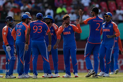 India's Kuldeep Yadav, center without cap, celebrates with teammates after the dismissal of England's Harry Brook during the ICC Men's T20 World Cup second semifinal cricket match between England and India on June 27, 2024. 