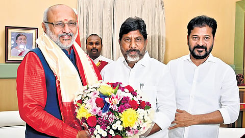 Chief MinisterA  Revanth Reddy and Deputy Chief Minister Mallu Bhatti Vikramarka call on Governor CP Radhakrishnan at the Raj Bhavan in Hyderabad 