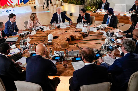 The summit opened Thursday with a strong show of support for Kyiv