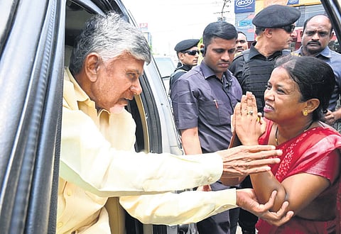 After stopping his convoy, Chief Minister-elect N Chandrababu Naidu met Nandini who came to see him from Madanapalli, in Vijayawada on Tuesday 