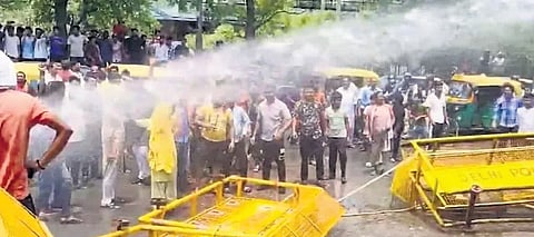 Water cannons being used on BJP protestors before DJB office on Saturday
