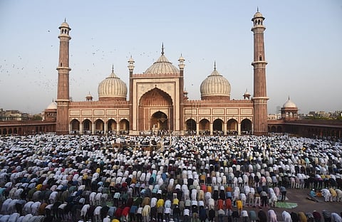 Devotees gathered at the Jama Masjid to offer namaz on the occasion of Eid-ul-Adha festival, in New Delhi.