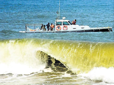 Coastal guards conducting a search for Mahesh, who went missing after the fishing boat capsized at Shankhumukham on Saturday 
