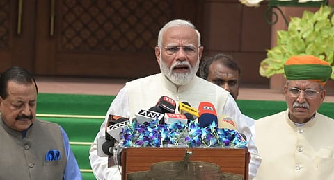 Prime Minister Narendra Modi addressing the media on the first day of the 18st Session at Parliament House in New Delhi on Monday. 
