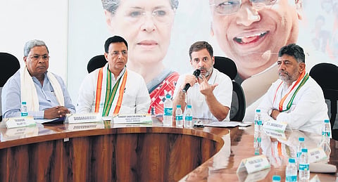 Congress leader Rahul Gandhi interacts with newly-elected party MPs and defeated candidates at the KPCC office in Bengaluru on Friday. CM Siddaramaiah, Dy CM 
DK Shivakumar, and Congress General Secretary Randeep Singh Surjewala look on 