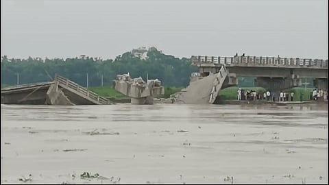 A portion of newly constructed bridge over Bakra River collapses in Bihar's Araria district on Tuesday.
