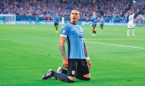 Darwin Nunez celebrates his goal. (Inset) Uruguay’s head coach Marcelo Bielsa.