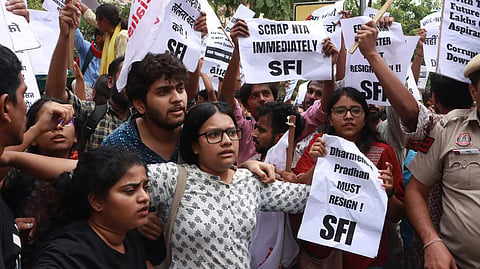 Members of Students Federation of India  and other students union stage a protest over NEET-UG and UGC-NET issues outside Shastri Bhawan, in New Delhi