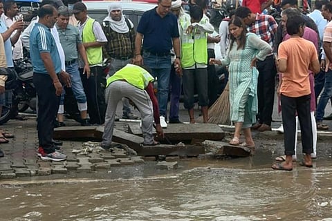 Delhi MP Kamaljeet Sehrawat oversees the clearing of  waterlogging in the city