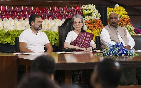 Congress President Mallikarjun Kharge with Congress Parliamentary Party  Chairperson Sonia Gandhi and party leader Rahul Gandhi.