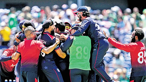 USA players celebrate their historic win over Pakistan on Thursday.