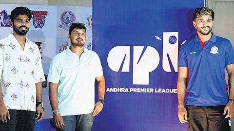 Cricketers KS Bharat, Ricky Bhui and Nitish Kumar Reddy unveiling the new logo for APL Season 3