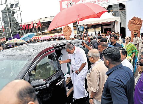 Chief Minister Pinarayi Vijayan returns to his vehicle after inaugurating the NGO state conference at Kozhikode beach on Saturday 