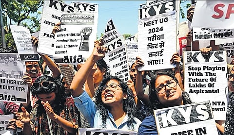 Students protest during the ongoing NEET crisis