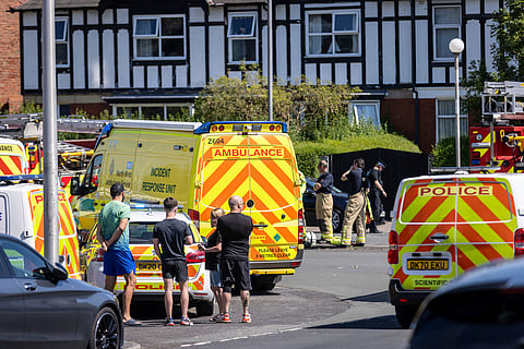 Police and emergency services arrive at the site where a man has been detained and a knife has been seized after a number of people were injured in a reported stabbing, in Southport, Merseyside, England, Monday July 29, 2024. 