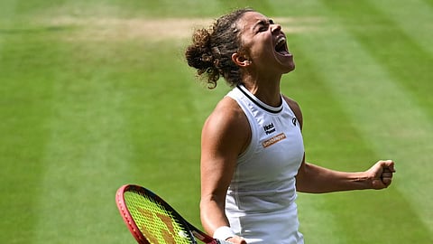 Italy's Jasmine Paolini celebrates winning against Croatia's Donna Vekic during their women's singles semi-final tennis match at The All England Lawn Tennis and Croquet Club in Wimbledon on July 11, 2024. 