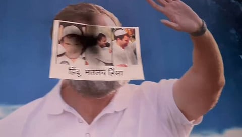 A poster of Opposition leader Rahul Gandhi at the Congress office in Gujarat's Rajiv Gandhi Bhavan was defaced by VHP and Bajrang Dal workers on Monday.  
