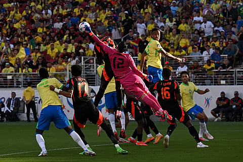 Colombia's goalkeeper #12 Camilo Vargas clears the ball during the Conmebol 2024 Copa America tournament group D football match between Brazil and Colombia on July 2, 2024.